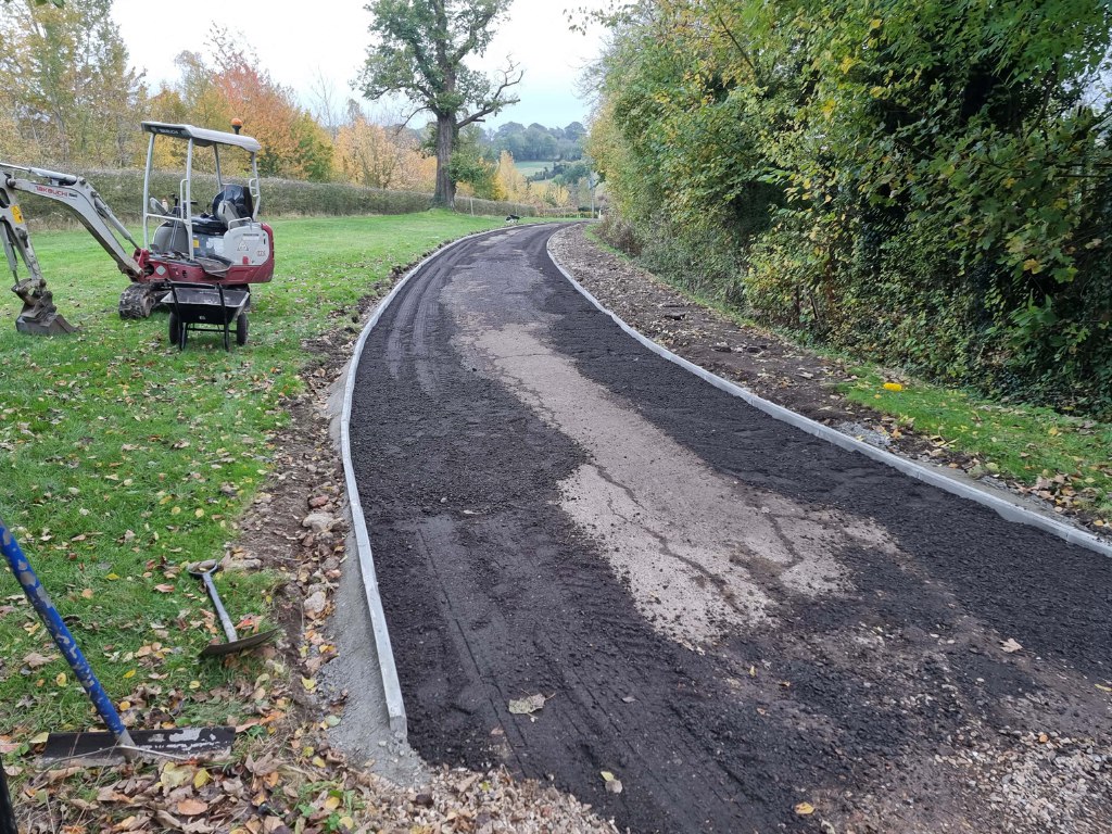 This is a large driveway which is in the process of having a tar and chip driveway installed on by Tenterden Driveways