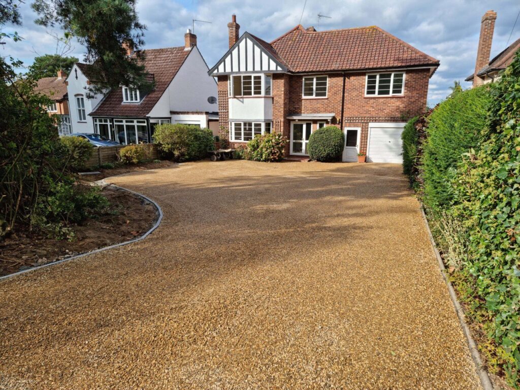 This is a newly installed tar and chip driveway installed by Tenterden Driveways